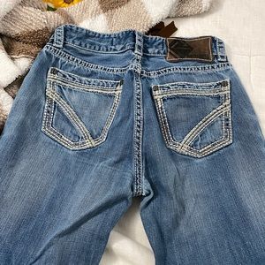 31x34 rock and roll cowboy